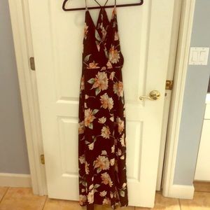 New without tags. Lulu’s black floral maxi dress.